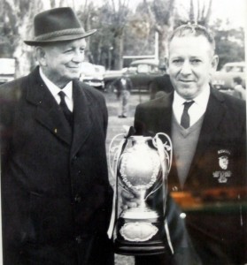 Vic Castrissian holding the Maher Cup, with local member Billy Sheahan at Gundagai
