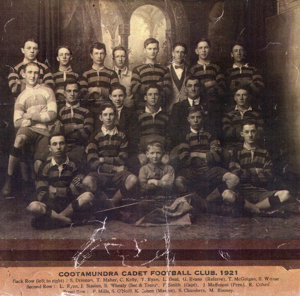 Cootamundra Cadets team of 1921 which included Eric Weissel; from left to right from back row: S. Drennan, T.Maher, C.Kelly, Tom Ryan, L.Deal, Glenn Evans (referee), Tom McGuigan, Eric Weissel (aged 18), L.Ryan, Jack Sissian, S.Whealy (secretary & treasurer), F.Smith (captain), J.Maffersoni (president), R.Cohen, P.Mills, S.O’Neill, K.Cohen (mascot), Sid Chambers, Mick Rooney. Source: S.G. Chambers, Cootamundra.